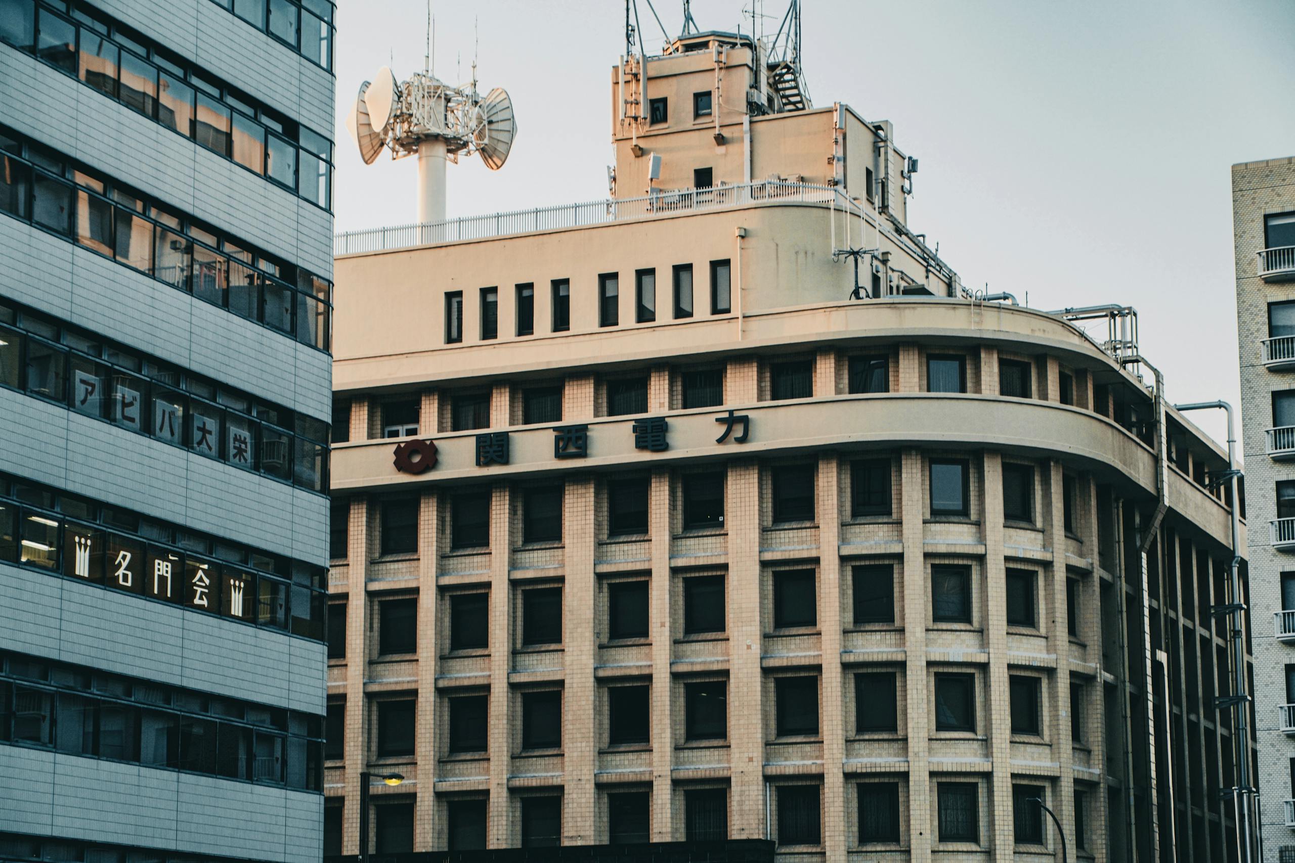 Modern urban architecture of Osaka featuring the Kansai Electric Power Company building.